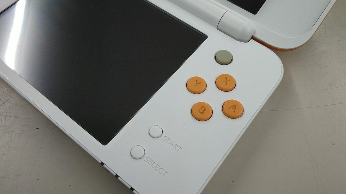 nintendo jan-001 handheld console side view