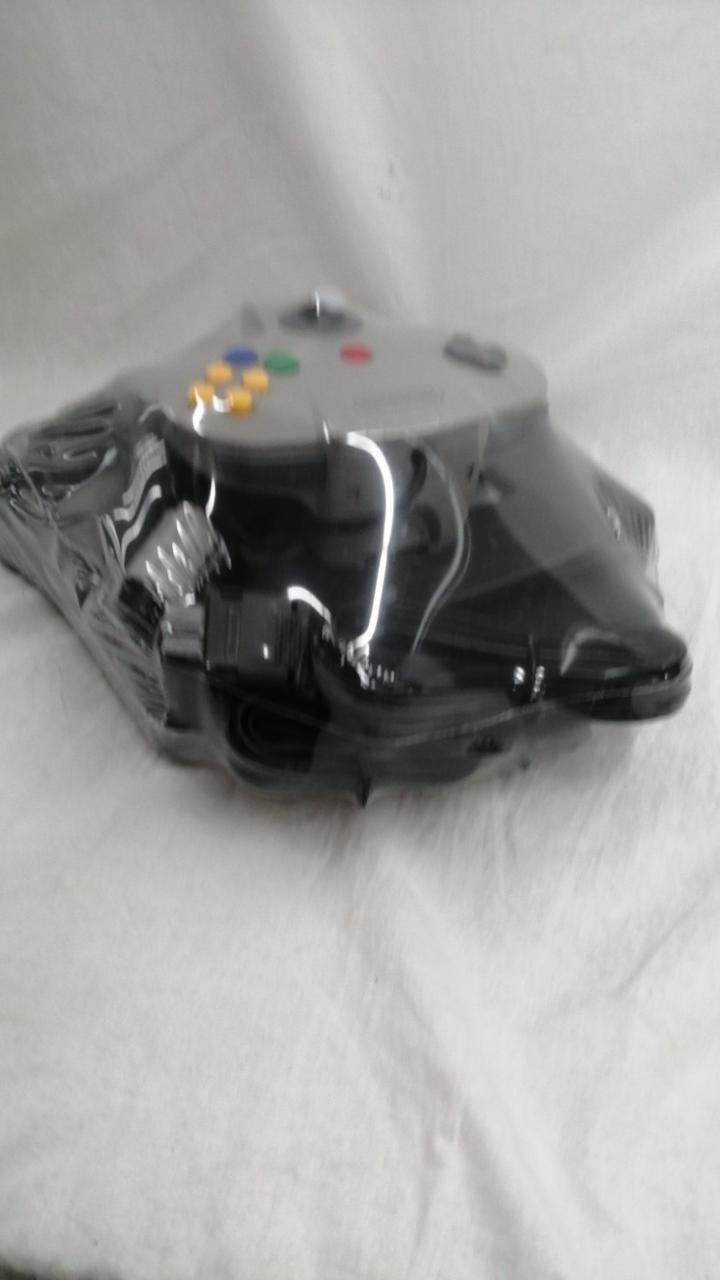 nintendo nus-001 video game console front view