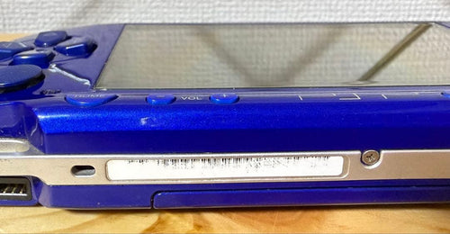 sony psp-1000 handheld console side view