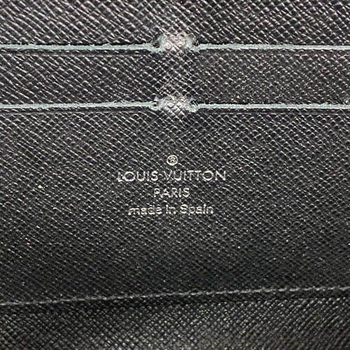 louis vuitton m60072 wallet side view