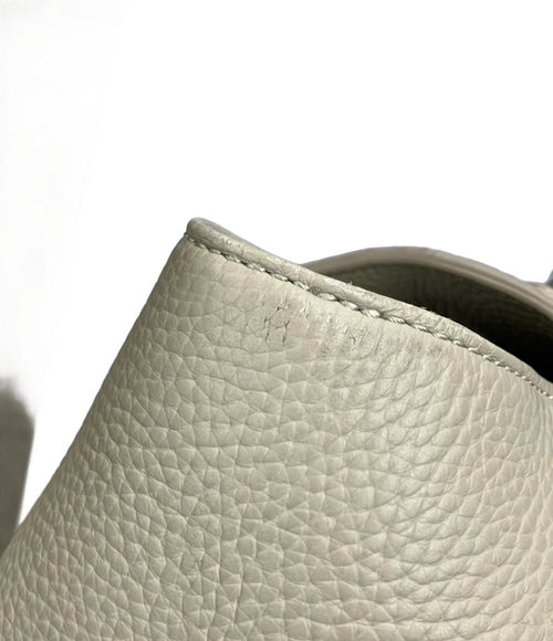 vasic beige shoulder bag markings and labels
