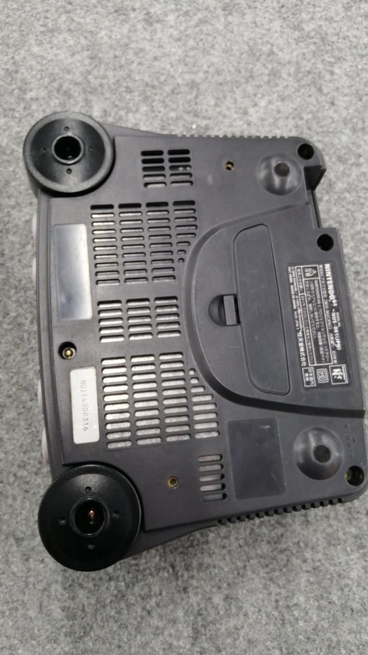 nintendo nus-001 video game console rear view