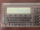 sharp pc-e500 pocket computer / calculator front view
