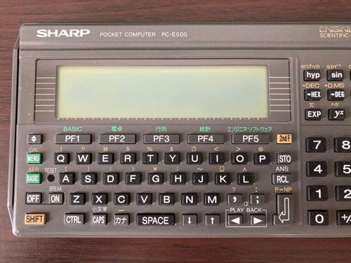 sharp pc-e500 pocket computer / calculator front view