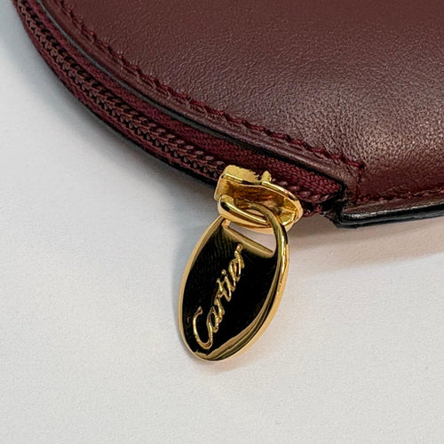 cartier coin purse side view