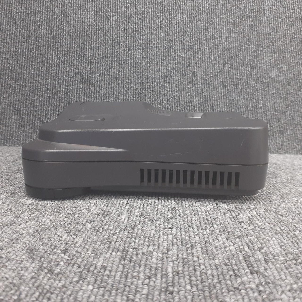 nintendo nus-001 video game console rear view