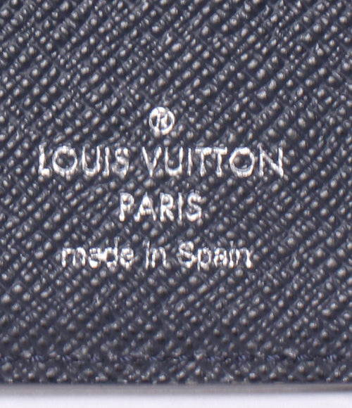 louis vuitton m61816 navy wallet side view