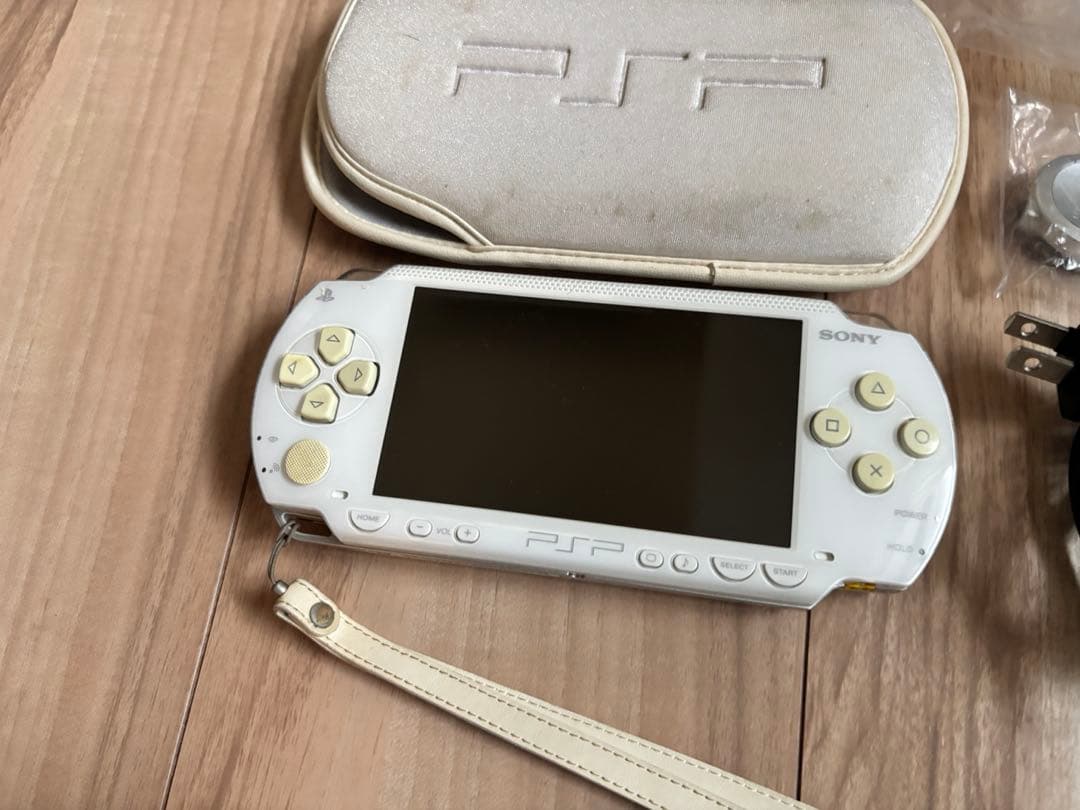 sony psp-1000 handheld console front view