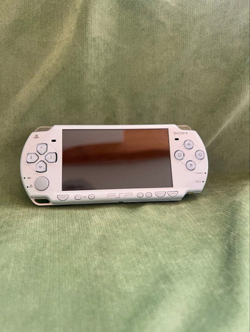 sony psp-2000 handheld console front view