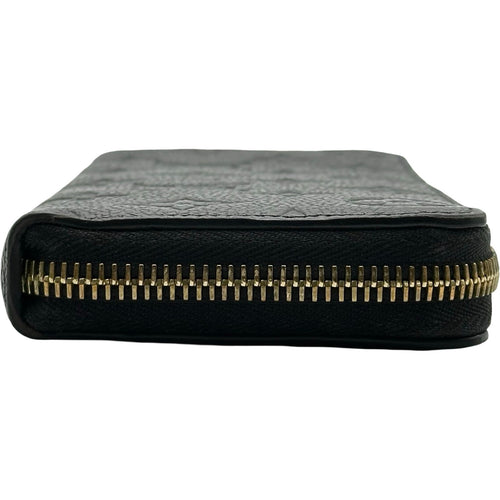 louis vuitton m60171 wallet side view