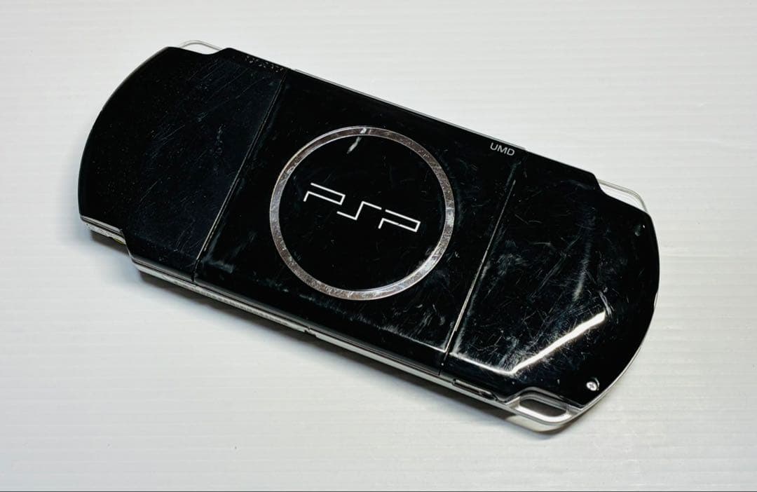 sony psp-3000 handheld console front view