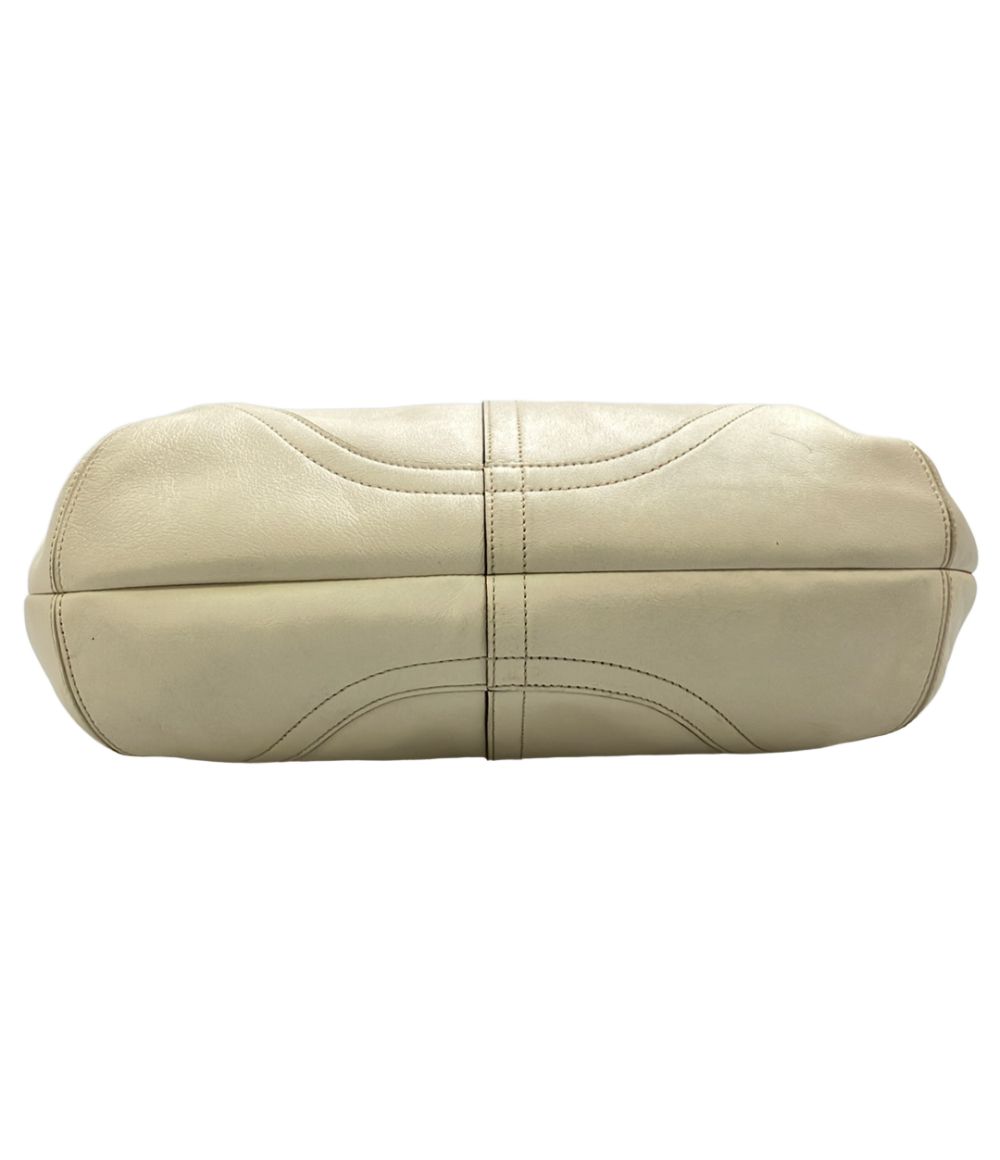 coach shoulder bag side view