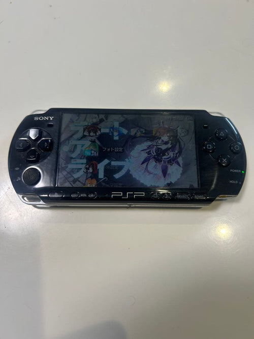 sony psp-3000 handheld console front view
