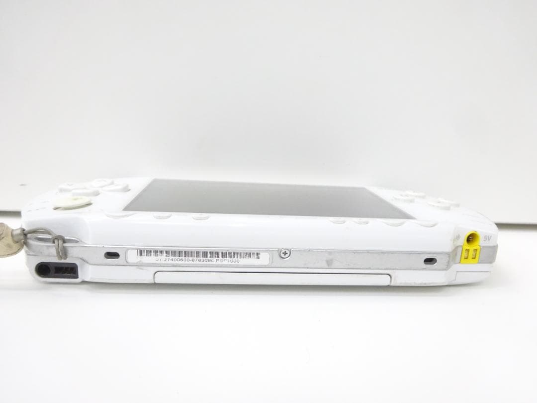 sony psp-1000 handheld console side view
