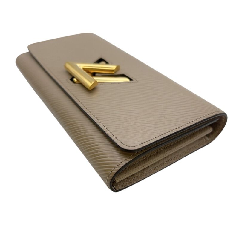 louis vuitton m67510 beige wallet side view