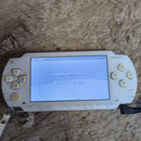 sony psp-1000 handheld console front view
