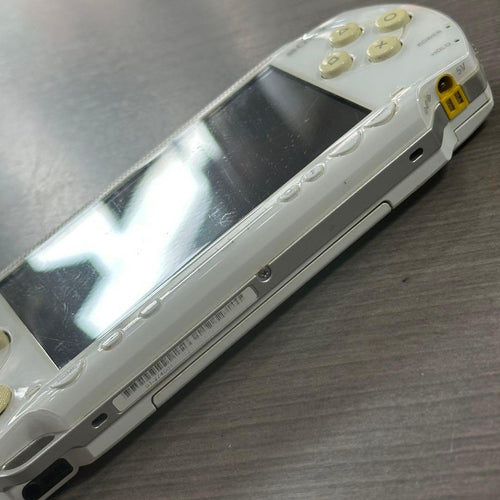 sony psp-1000 handheld console front view