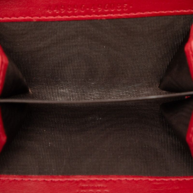 gucci coin purse side view