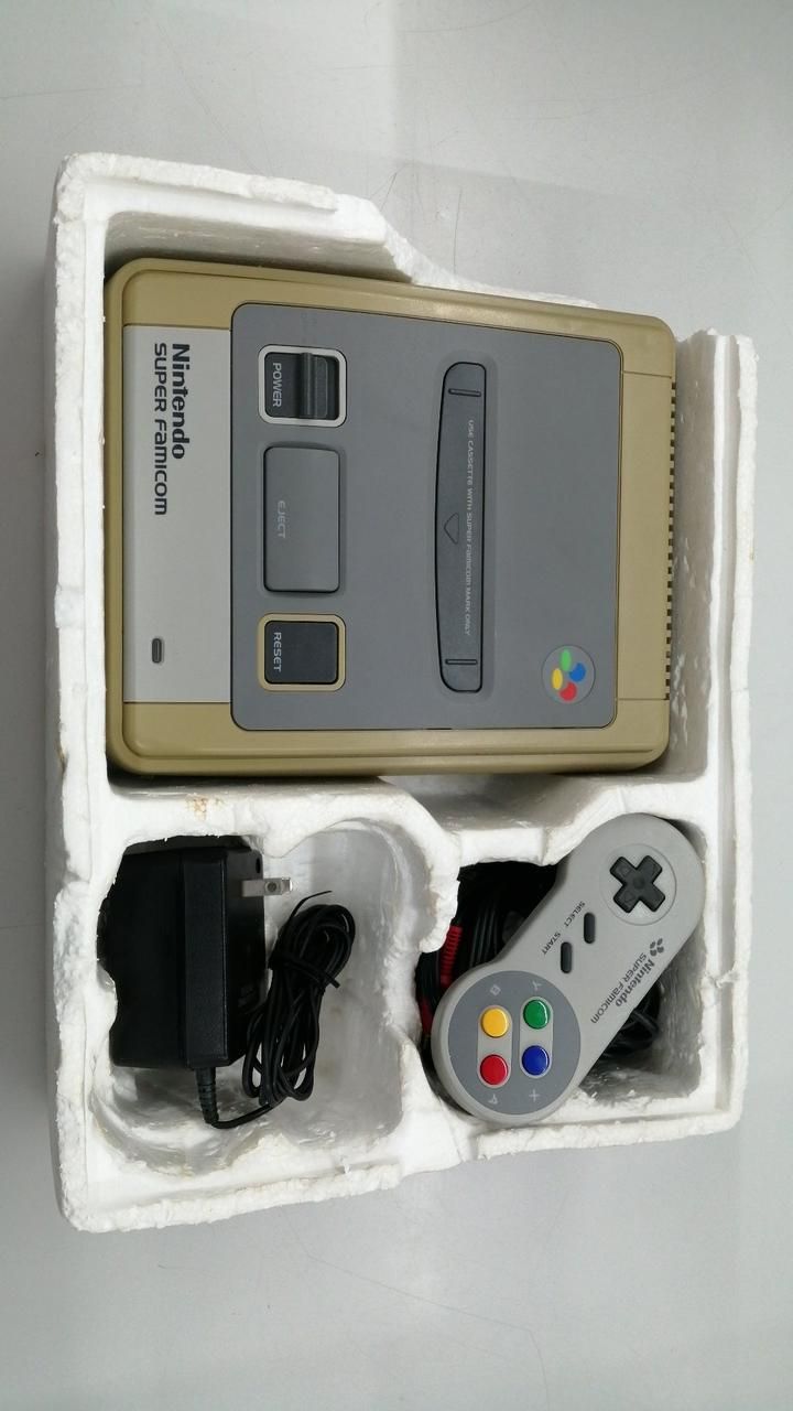 nintendo shvc-001 video game console side view