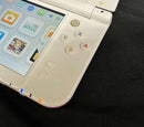nintendo red-001 red handheld console side view