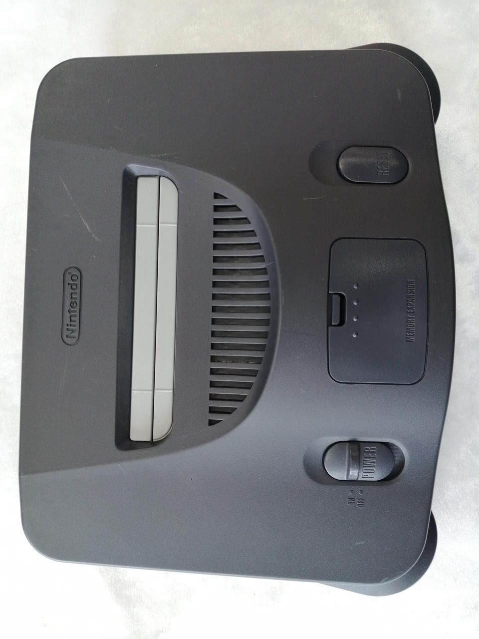 nintendo nus-001 video game console front view