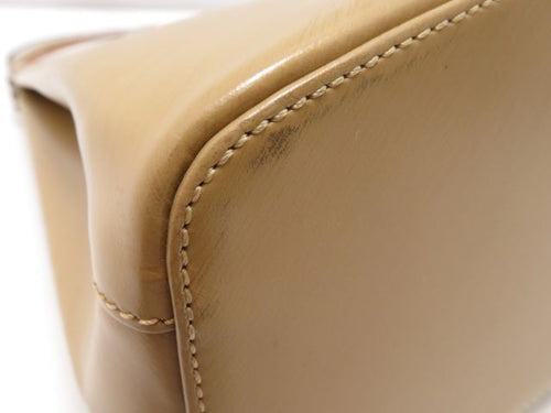 cartier beige shoulder bag markings and labels