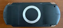 sony psp-1000 handheld console front view