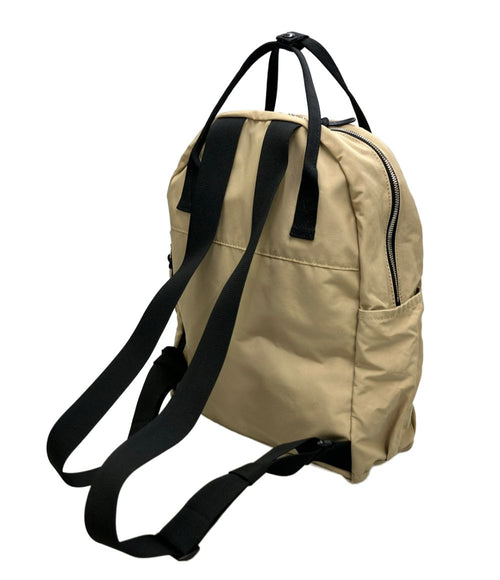 standard supply beige backpack rear view
