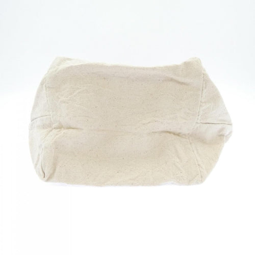 genten beige handbag side view
