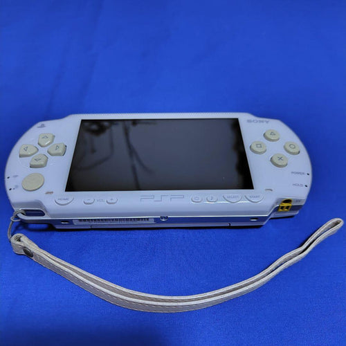 sony psp-1000 handheld console front view