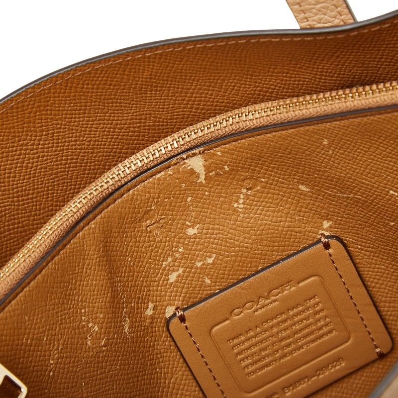 coach beige handbag functional details