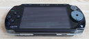 sony psp-1000 handheld console front view