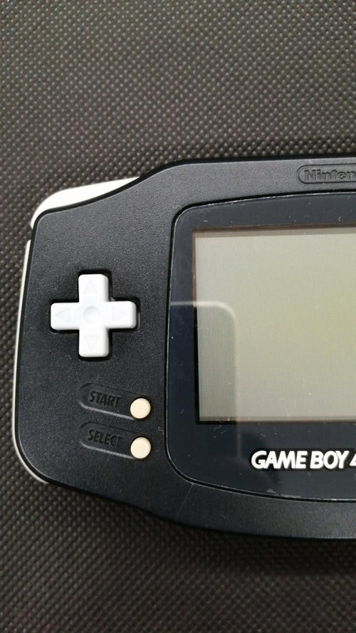 nintendo agb-001 handheld console front view