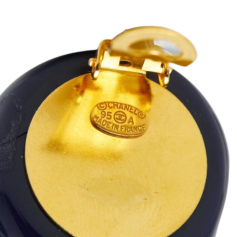 chanel navy earrings side view
