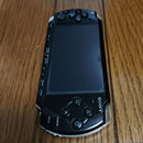 sony psp-2000 handheld console side view