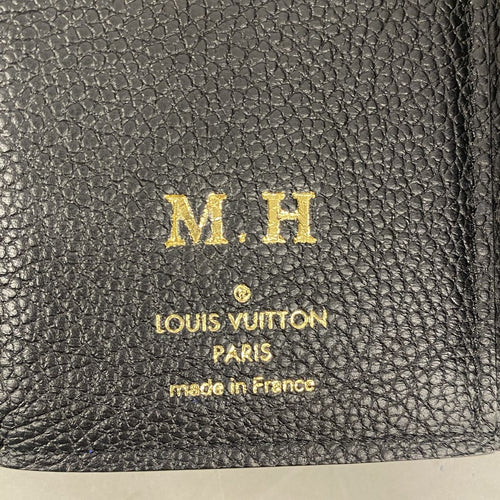louis vuitton m80968 beige wallet side view