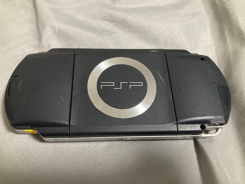 sony psp-1000 handheld console front view