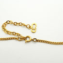 christian dior necklace side view