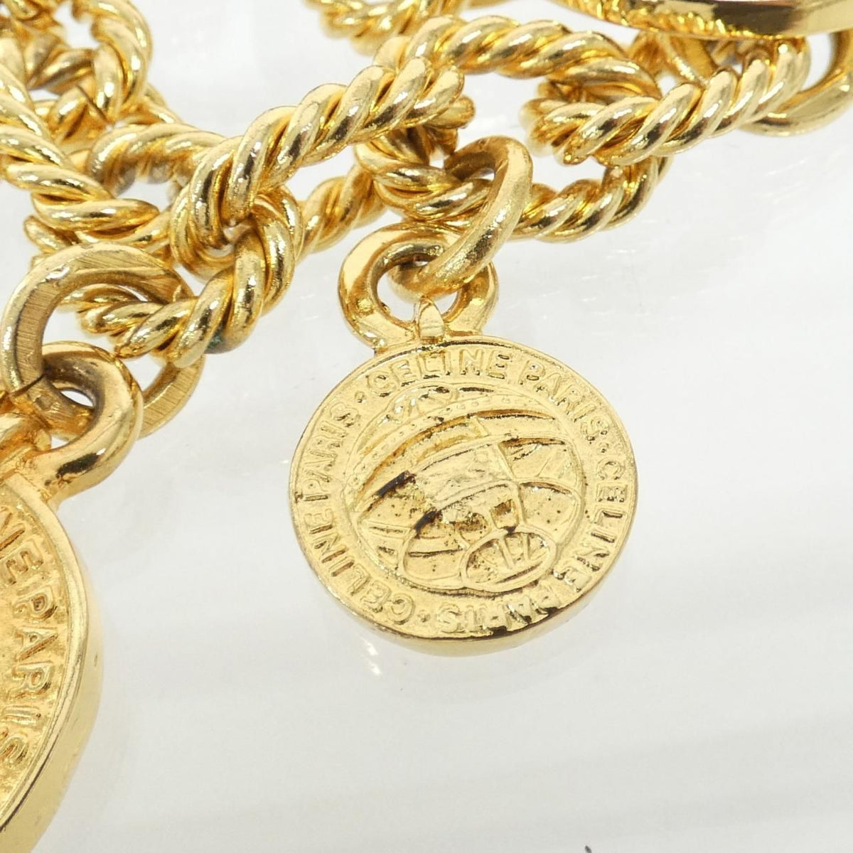 celine gold bracelet side view
