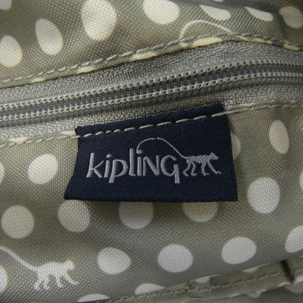 kipling navy ring accessories included