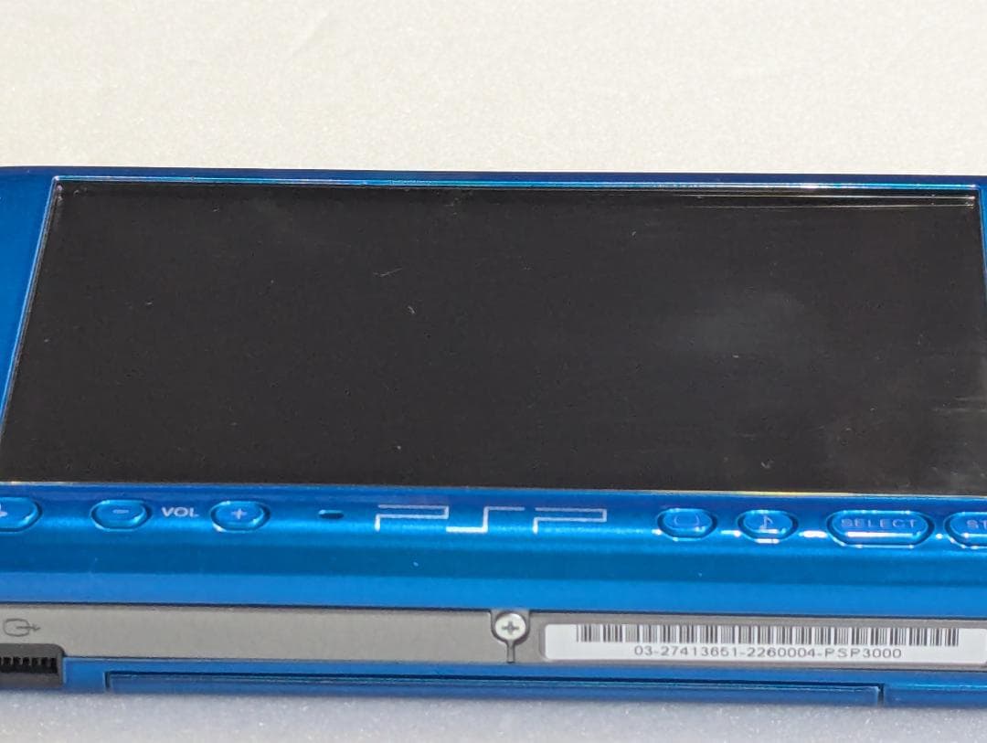 sony psp-3000 handheld console side view