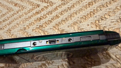 sony psp-3000 handheld console side view