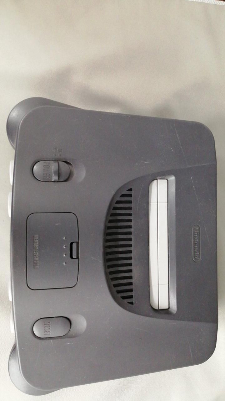 nintendo nus-001 video game console front view