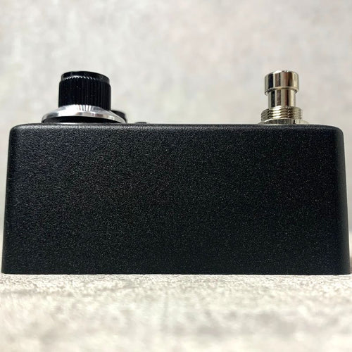 black guitar effector side view
