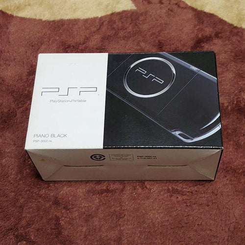 sony psp-3000 black handheld console front view