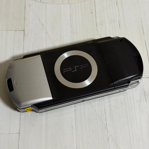 sony psp-1000 handheld console side view