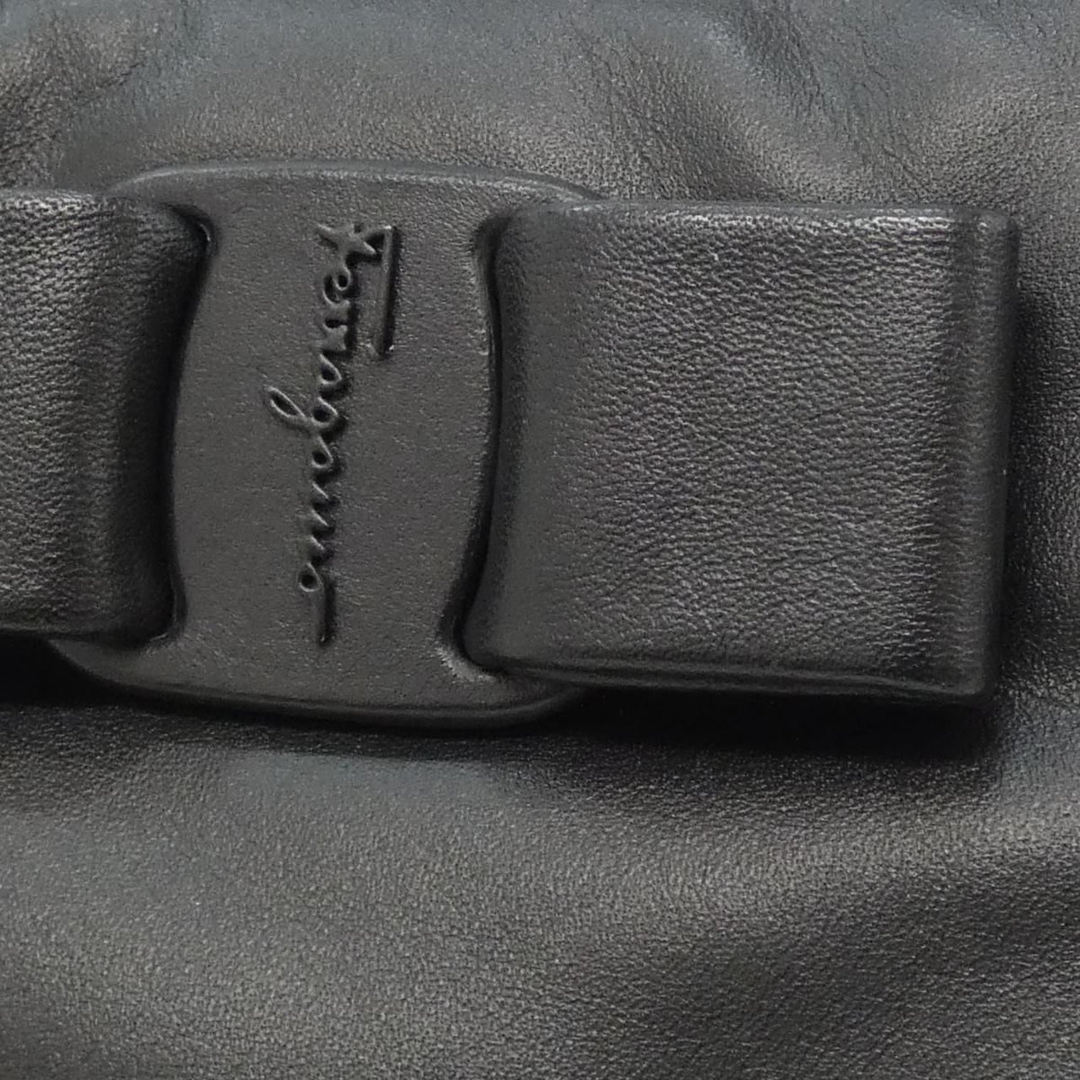 salvatore ferragamo black handbag side view