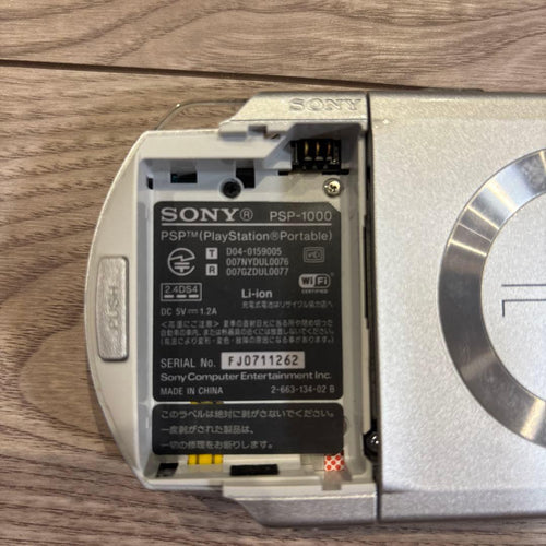 sony psp-1000 handheld console side view