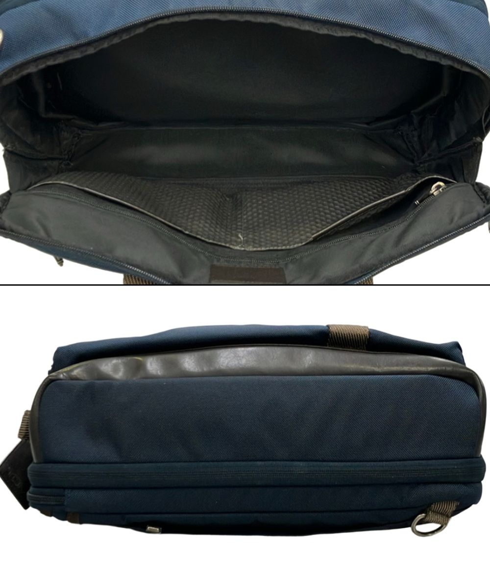 tumi navy briefcase side view
