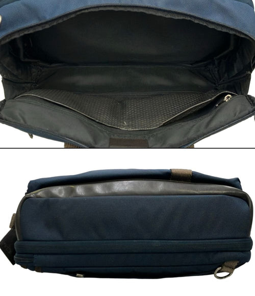 tumi navy briefcase side view